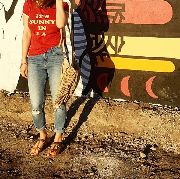 T-shirts style, broken denim jeans, fringe bag and sandals