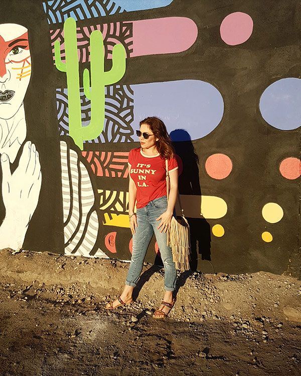 T-shirts style, broken denim jeans, fringe bag and sandals